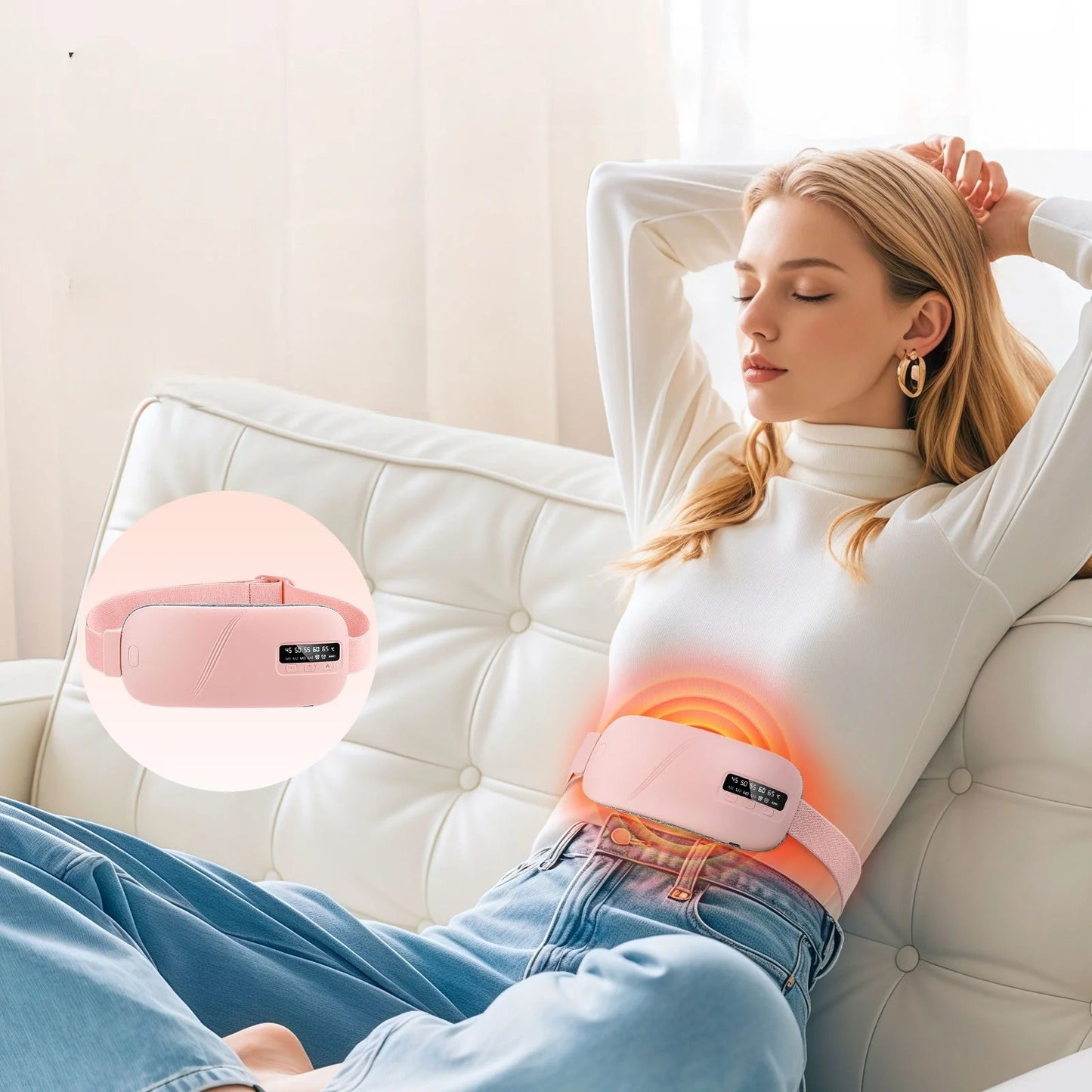 Woman using a pink electronic device on her abdomen while lying on a couch.